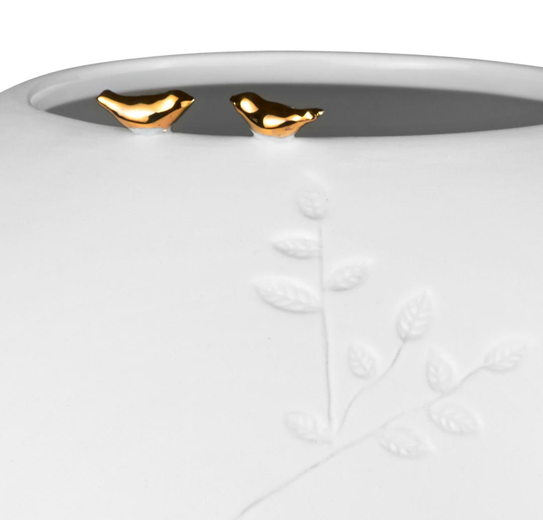 Räder, Vase, Vogel