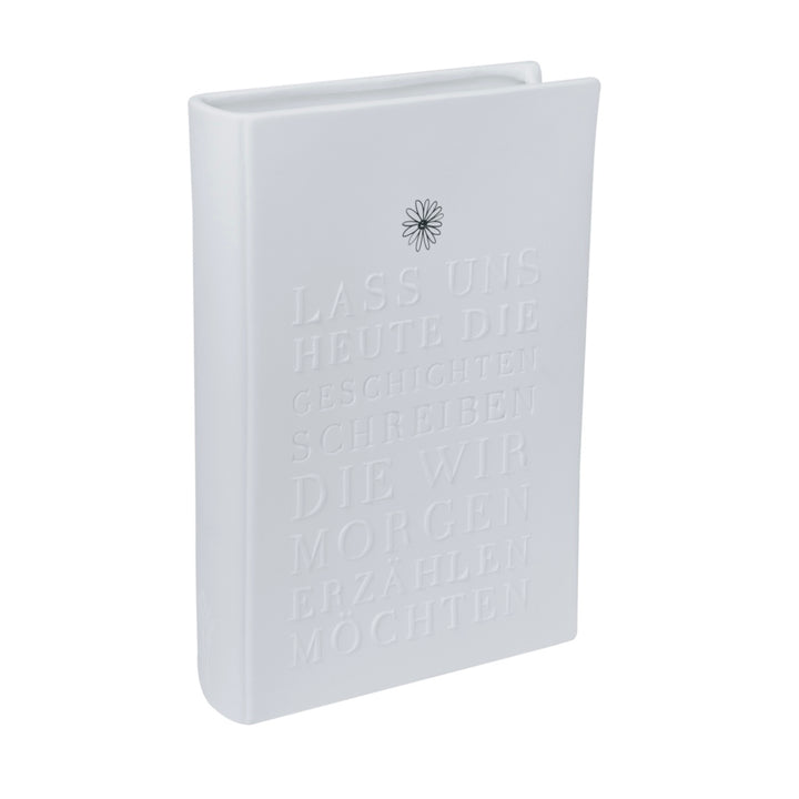 Räder, Vase, Buch